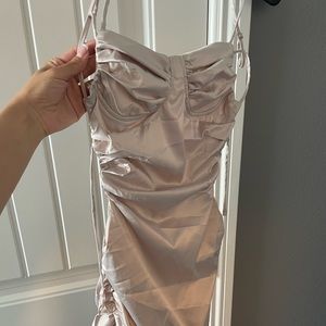 Light pink backless dress.